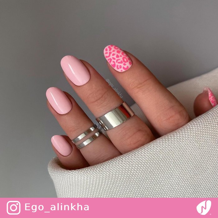 Leopard and Solid Pink Nails